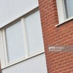 An exterior view of an apartment window of a house in Bromölla, southern Sweden, where used to live a woman on suspicion of locking her daughters away for a decade. Police suspected the 59-year-old woman had 